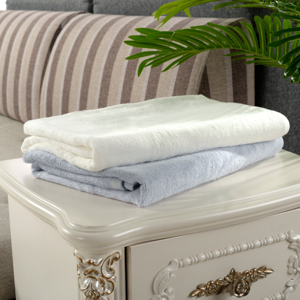 Bamboo bath towels in White and Blue — folded stacks