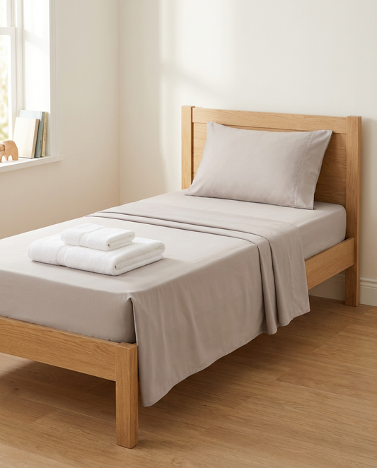 Big Kid Bed Bundle — Beige single sheet set with white bath and hand towels
